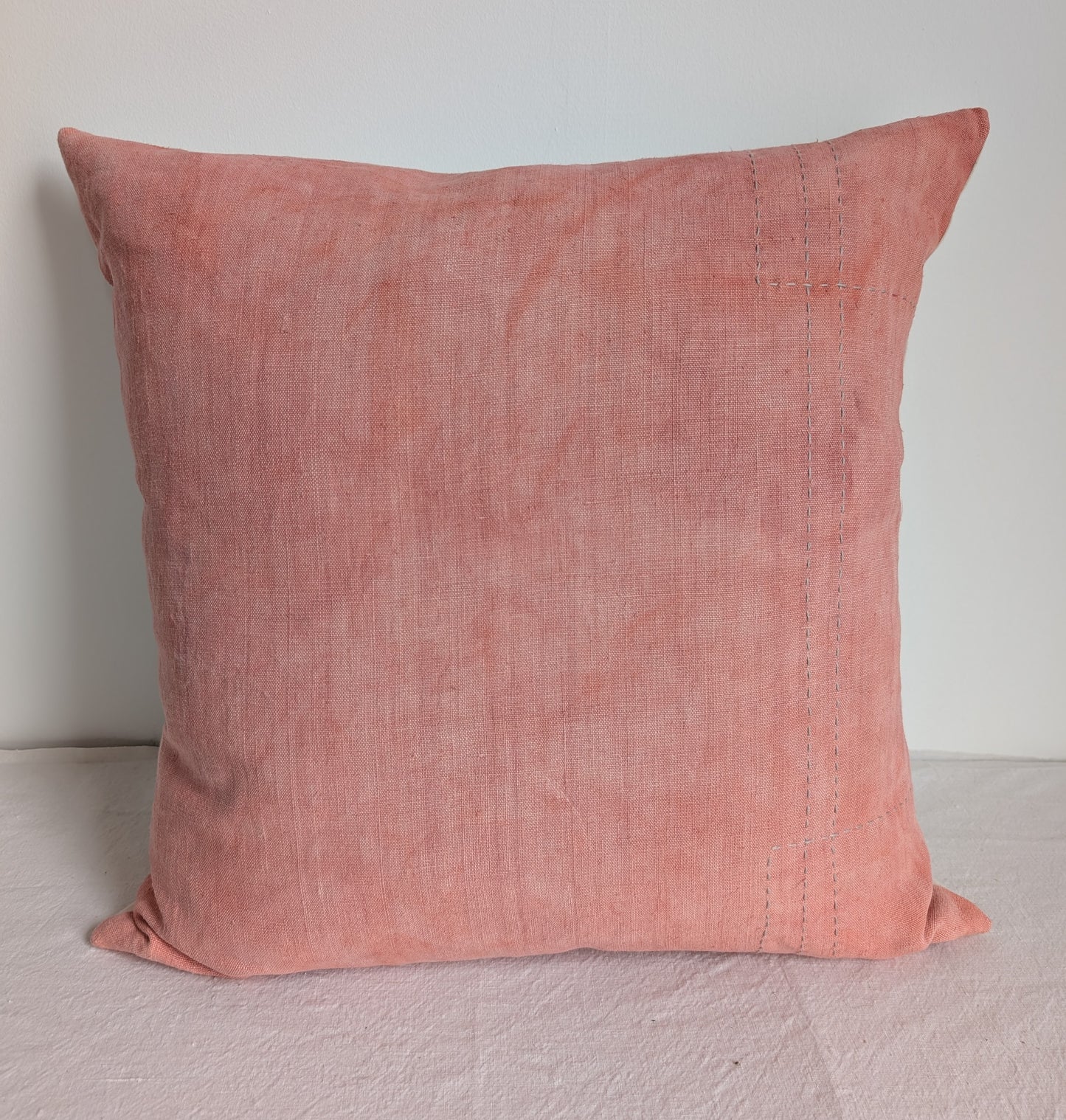 Pink linen cushion dyed with madder