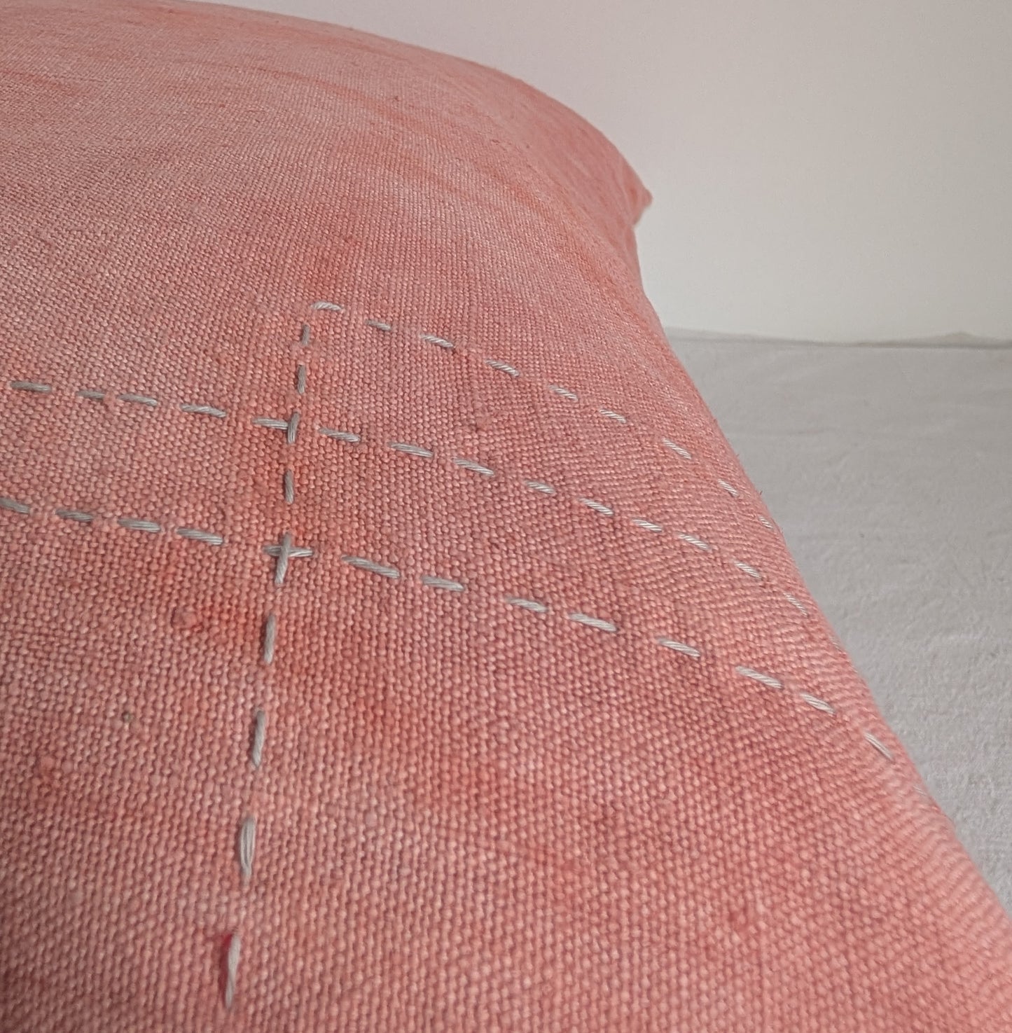 Pink linen cushion dyed with madder
