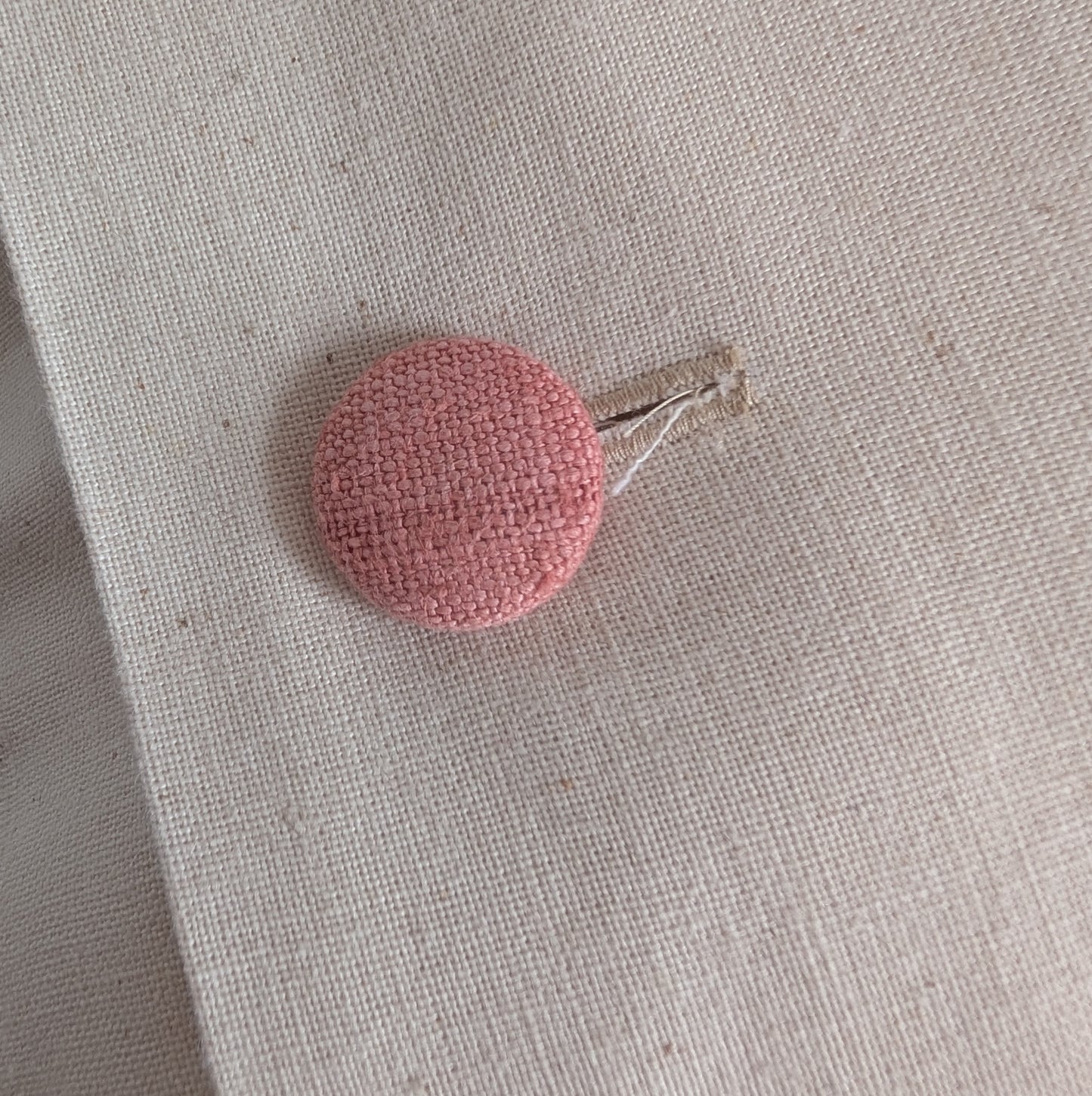 Pink linen cushion dyed with madder