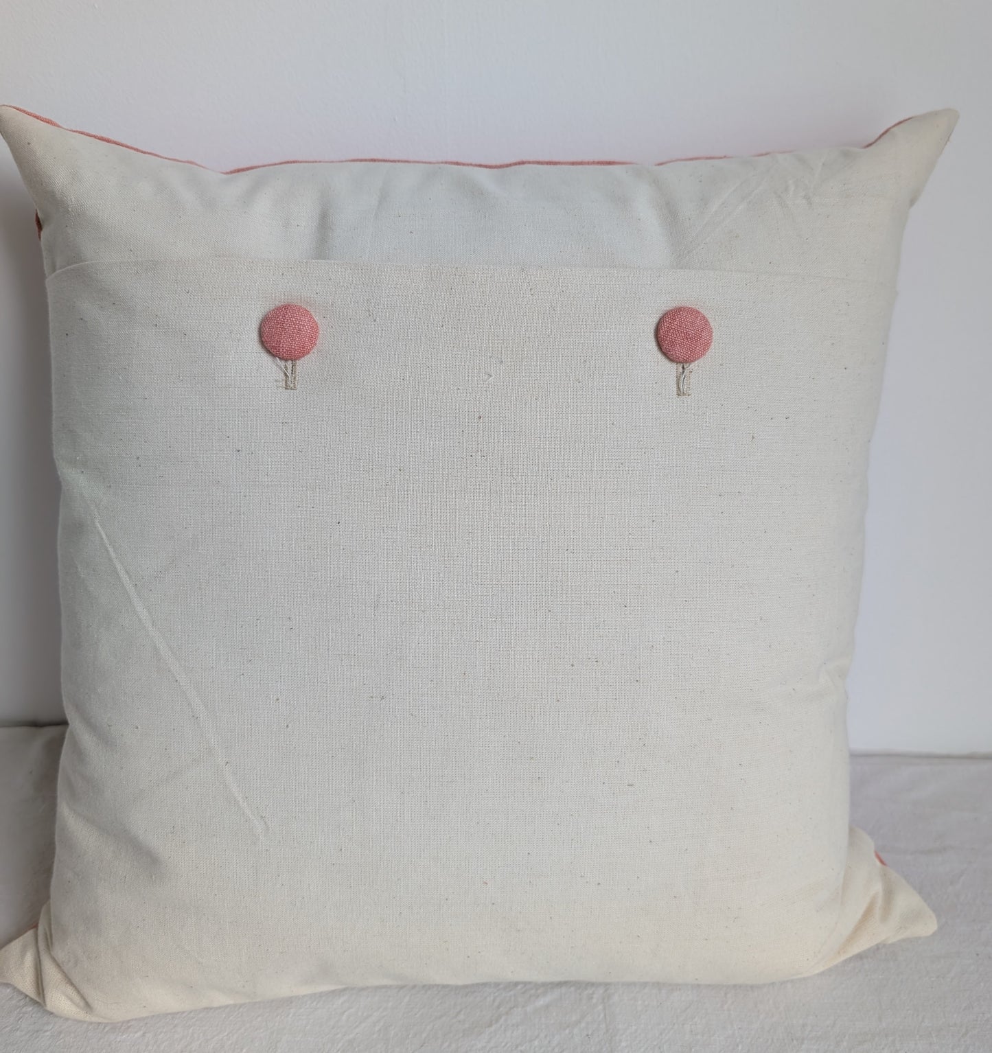 Pink linen cushion dyed with madder
