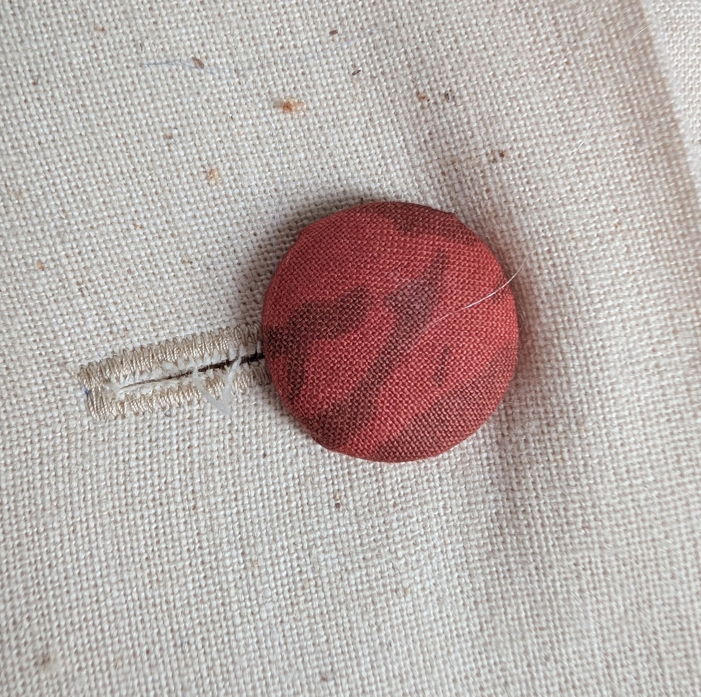 Rose red floral cushion dyed with madder