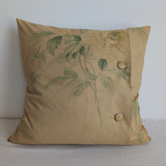 Light yellow floral cushion dyed with rhubarb root