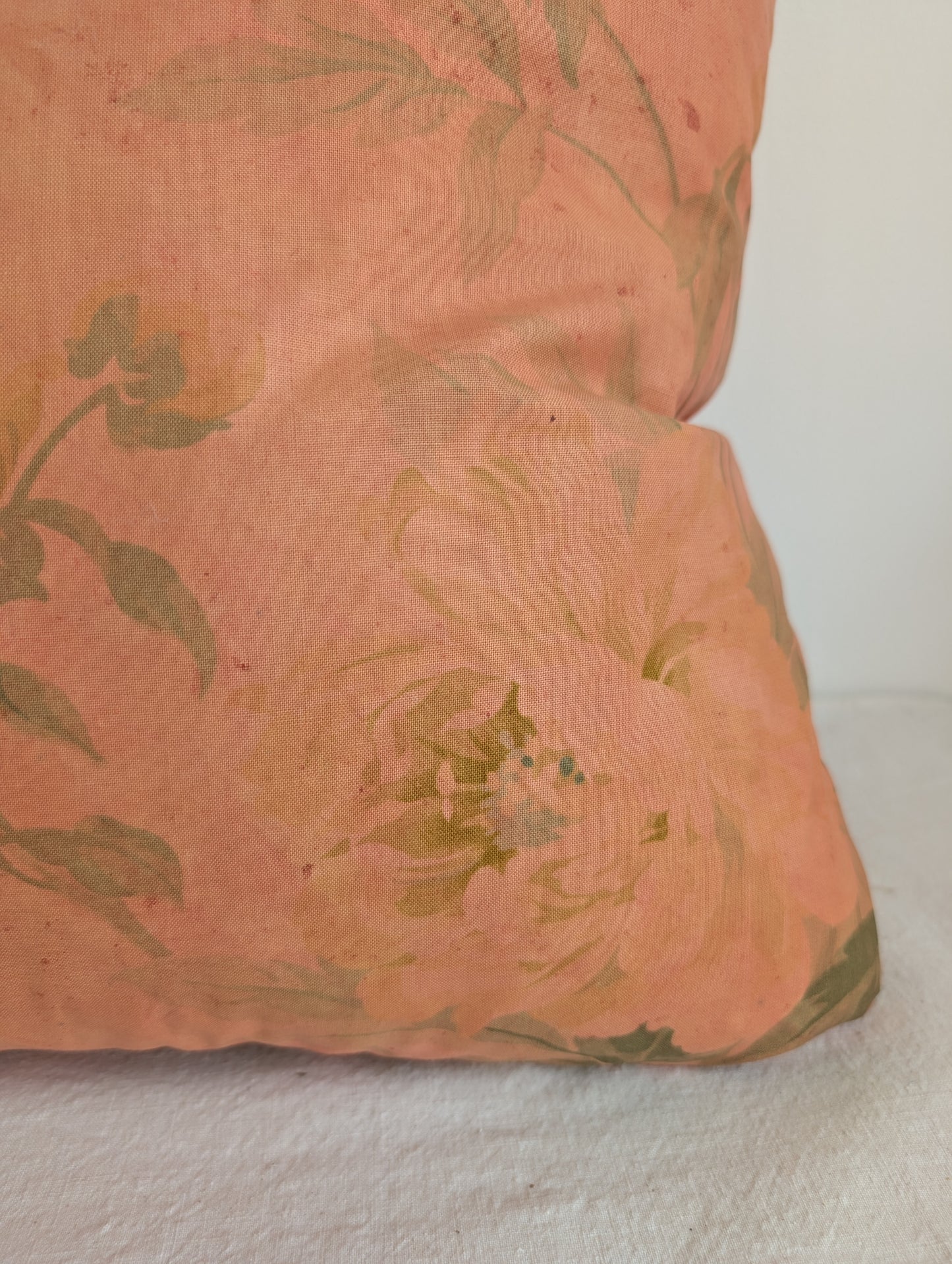 Coral floral cushion dyed with madder