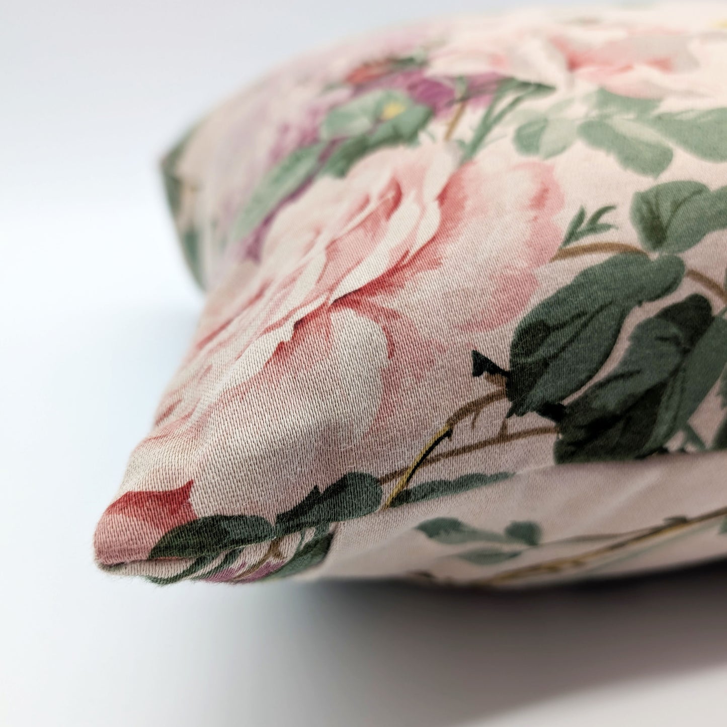 Beige and pink floral cushion dyed with walnut