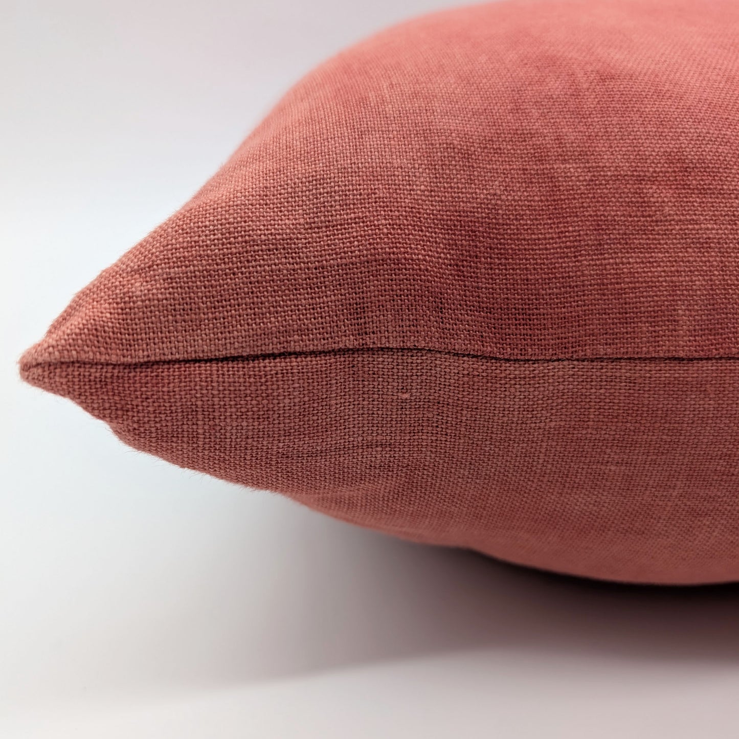 Terracotta linen cushion dyed with madder