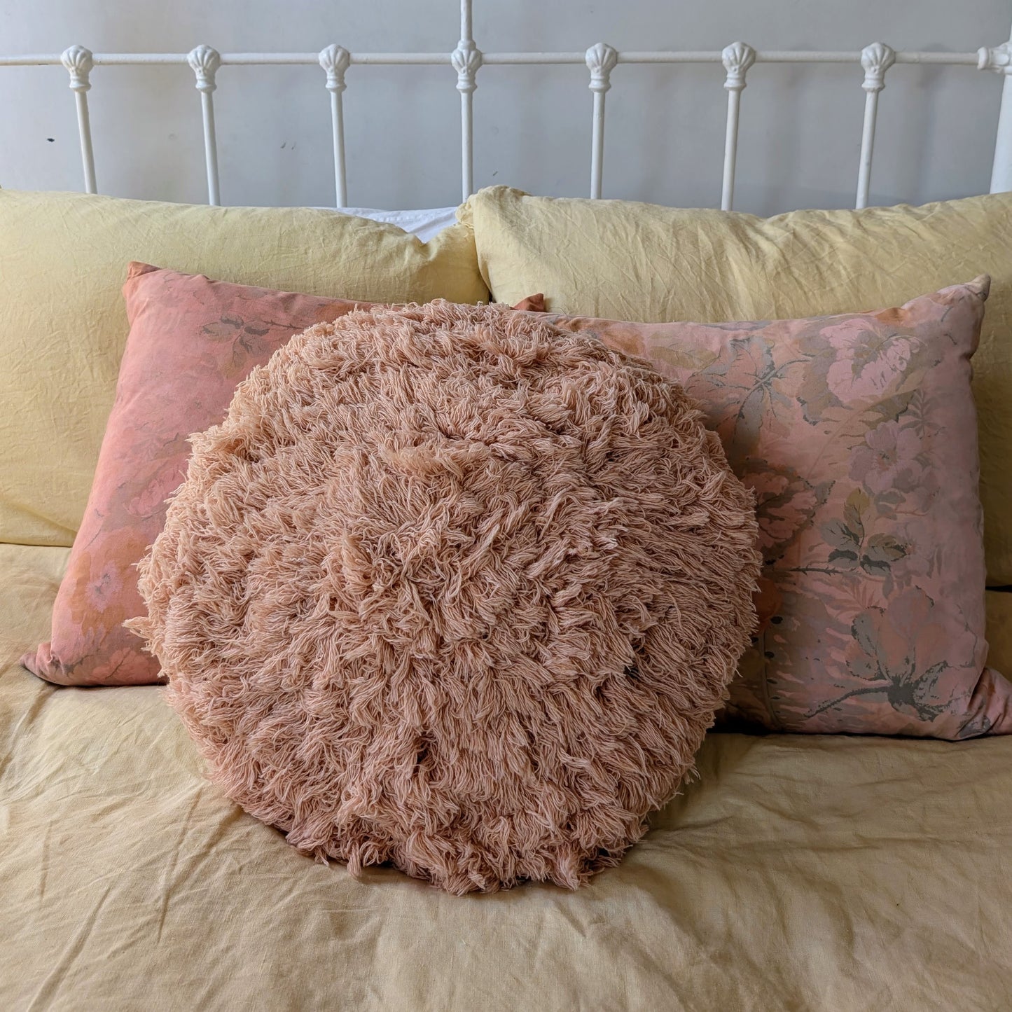 Peach wool fluffy cushion