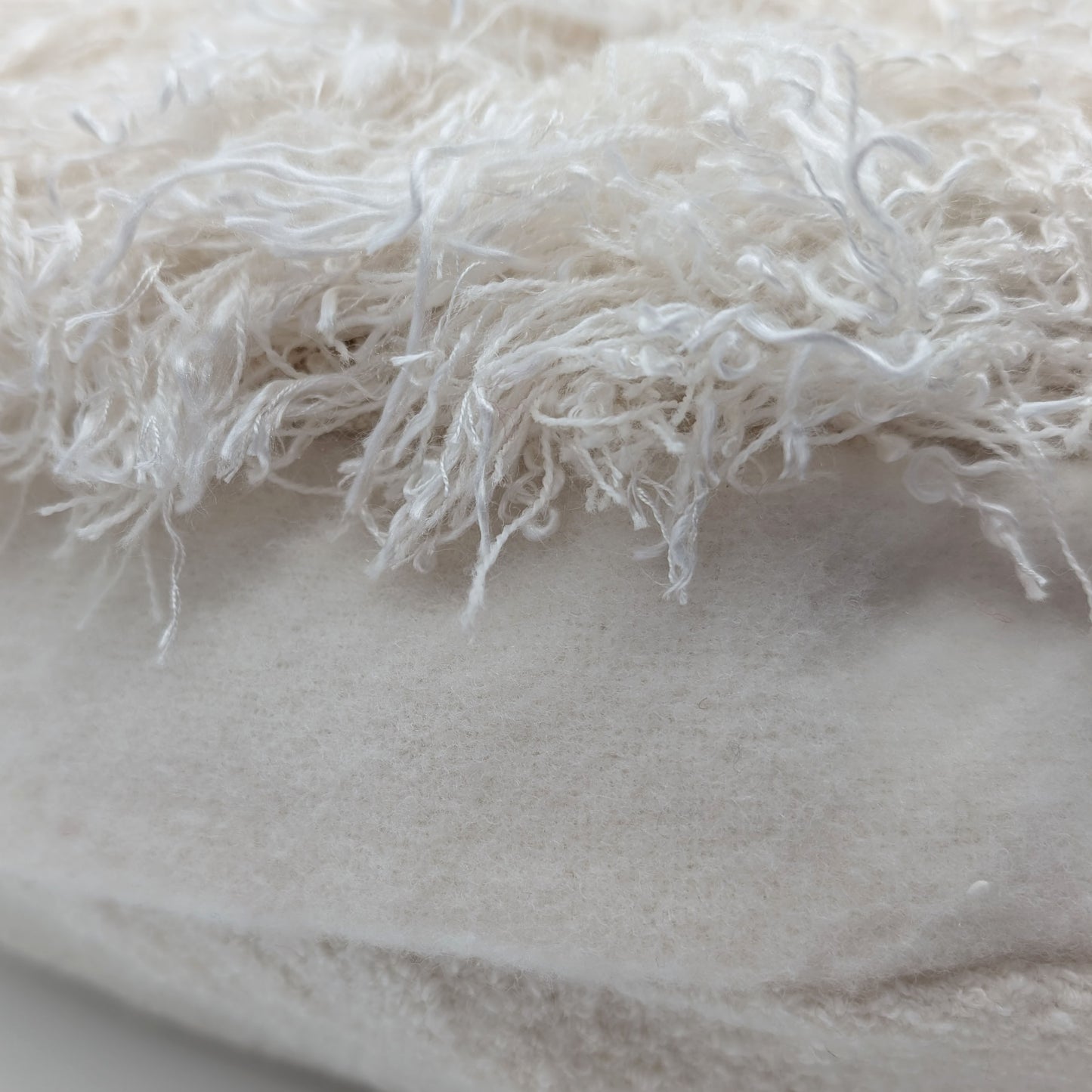 White round wool fluffy cushion