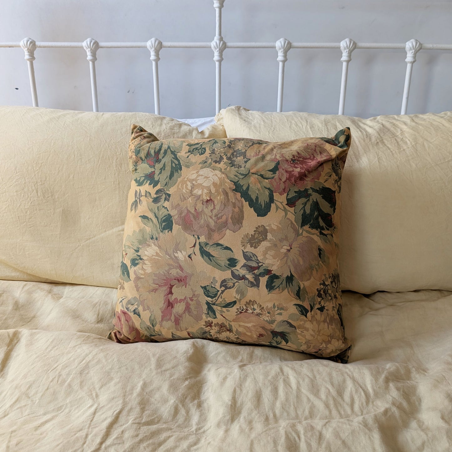 Yellow floral cushion dyed with pomegranate