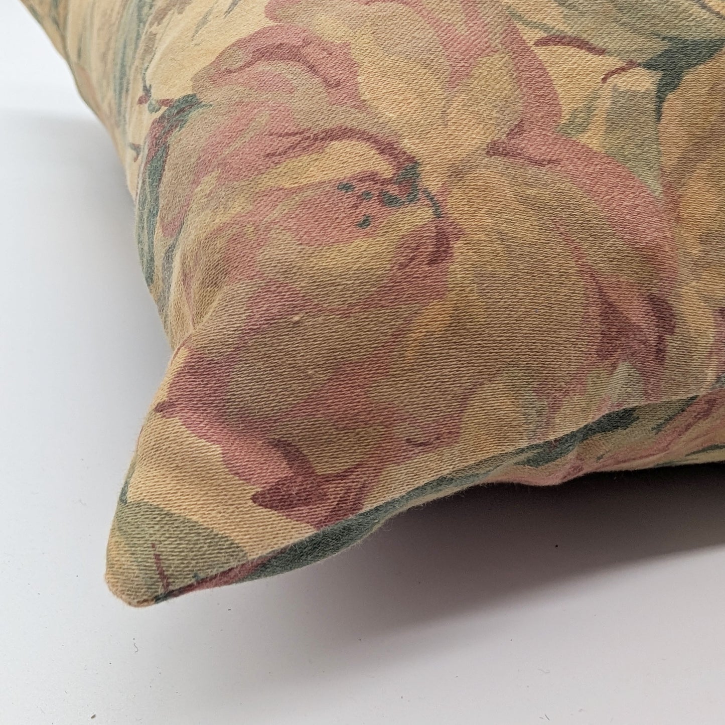 Yellow floral cushion dyed with pomegranate